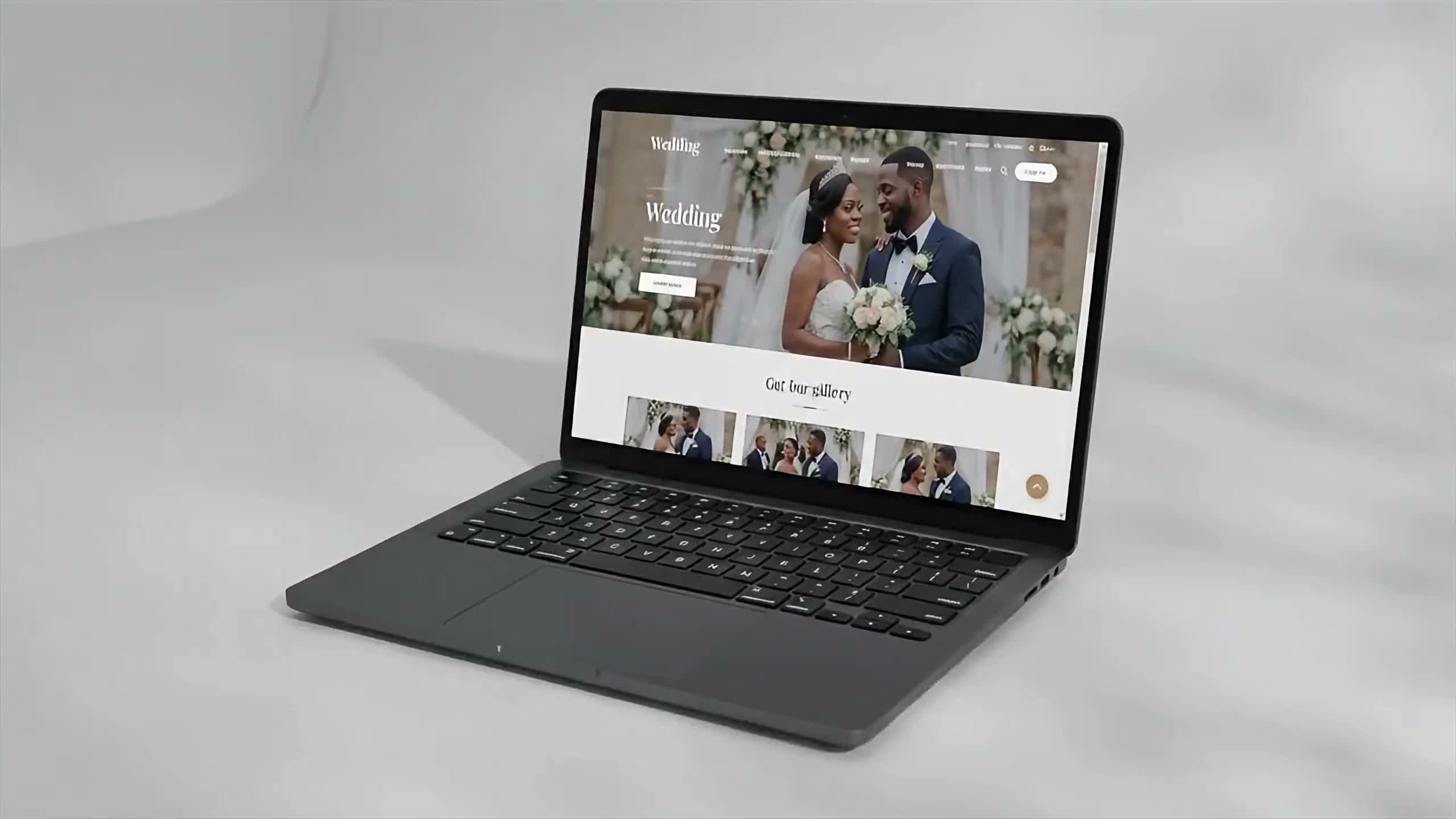 A fully assembled laptop showing a finished website
